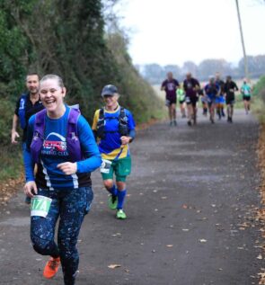 Warrington-Way-Ultra-Header Warrington Way Ultra showing athletes racing on the course along a quiet country lane.